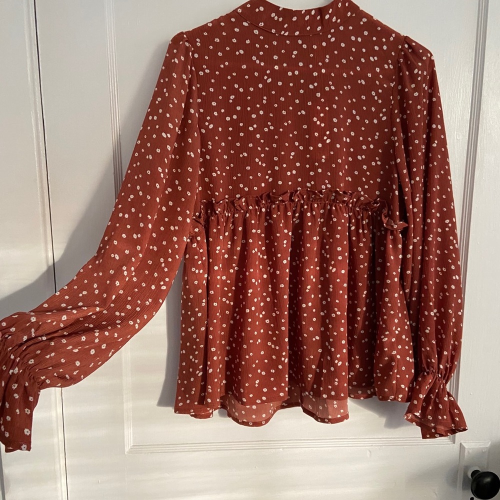 Glam burnt orange top with ruffles NWT boutique